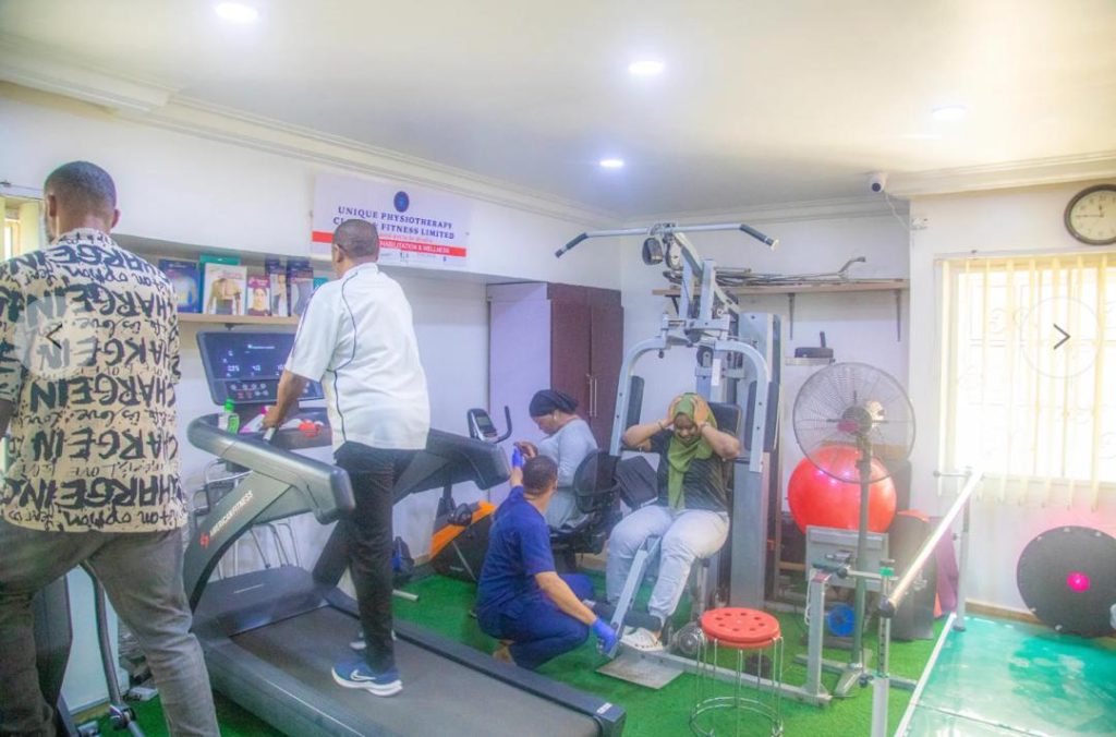 Physiotherapist in Abuja treating back pain